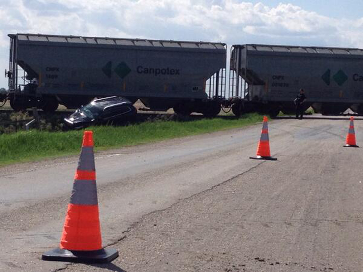 A woman hit a train on grid road northwest of Regina. No one was injured.