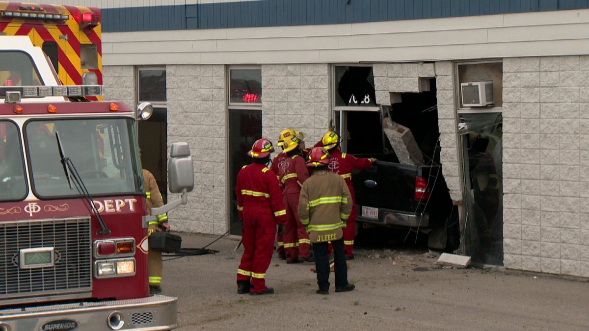 Emergency crews were called out to a commercial strip mall in southeast Calgary where a truck had crashed through the wall of a warehouse.