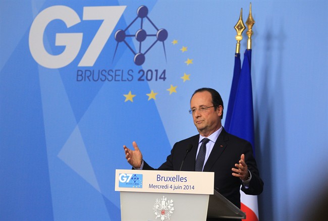 French President Francois Hollande addresses the media during a G7 summit at the European Council building in Brussels, Wednesday June 4, 2014.