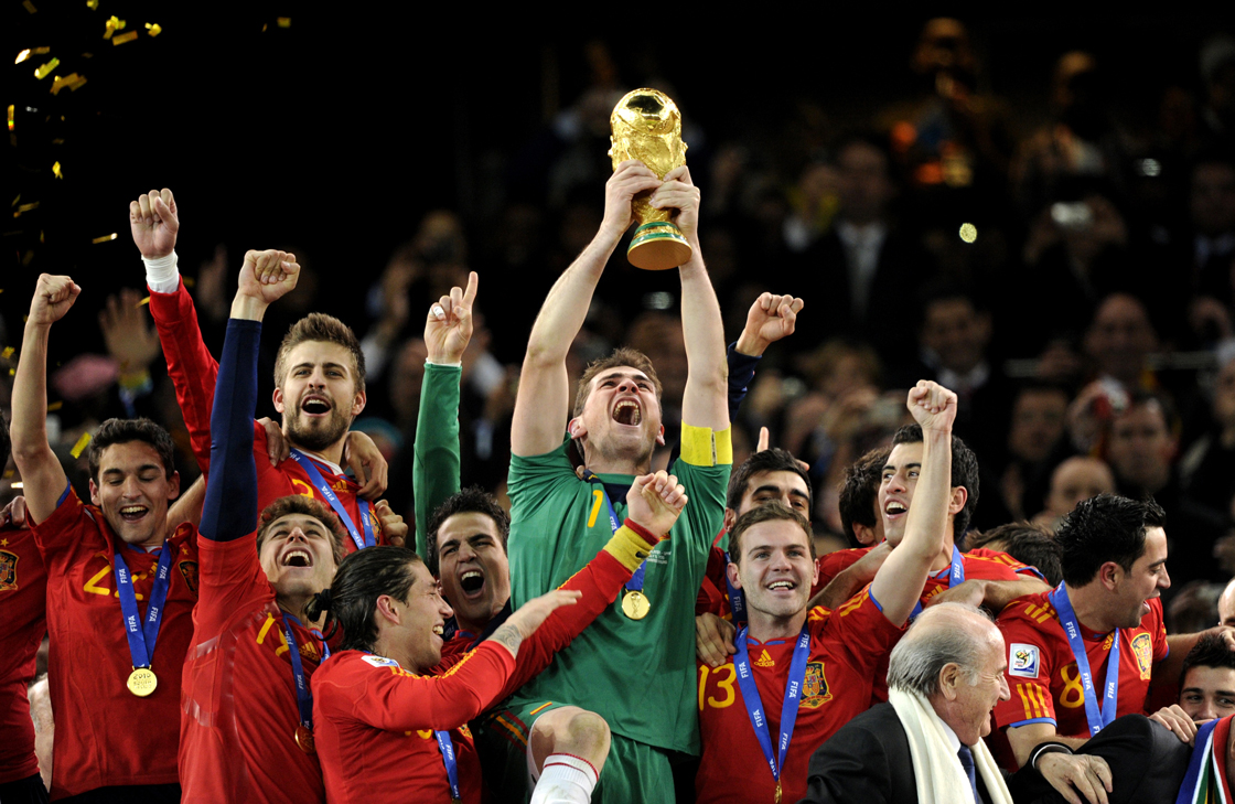 Spain's goalkeeper Iker Casillas holds the FIFA World Cup tropfy after winning the 2010 World Cup football final by defeating The Netherlands during extra time at Soccer City stadium in Soweto, suburban Johannesburg on July 11, 2010. NO PUSH TO MOBILE / MOBILE USE SOLELY WITHIN EDITORIAL ARTICLE - AFP PHOTO / JAVIER SORIANO (Photo credit should read JAVIER SORIANO/AFP/Getty Images)