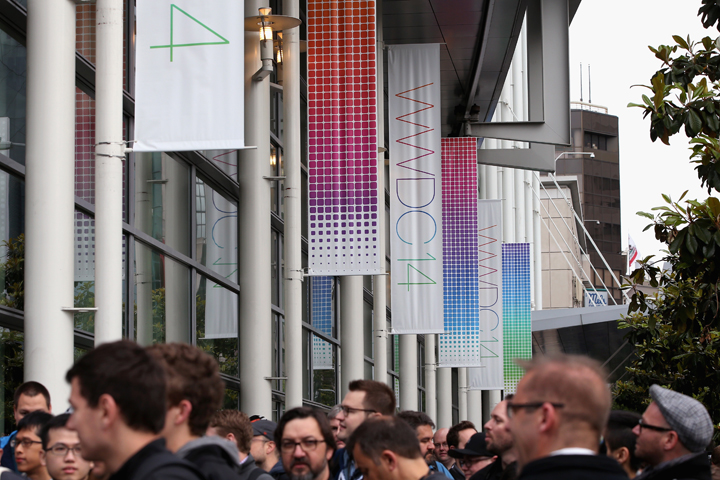 People wait to get in to the Apple Worldwide Developers Conference at the Moscone West center on June 2, 2014 in San Francisco.