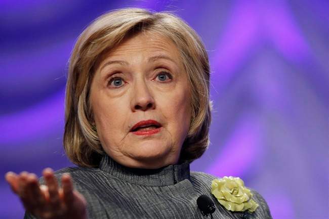 Hillary Rodham Clinton speaking in National Harbor, Md. As the 2016 campaign nears, she has begun to align herself with Barack Obama's policies.