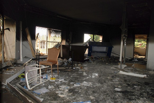  This Sept. 12, 2012 file photo shows glass, debris and overturned furniture are strewn inside a room in the gutted U.S. consulate in Benghazi, Libya, after an attack that killed four Americans, including Ambassador Chris Stevens. 