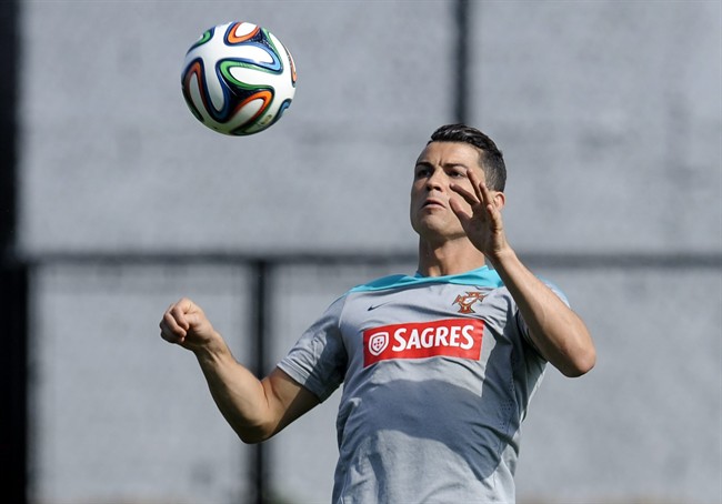 Cristiano Ronaldo controls the ball during a training session of Portugal in Campinas, Brazil, Thursday, June 19, 2014. Portugal plays in group G of the Brazil 2014 soccer World Cup.