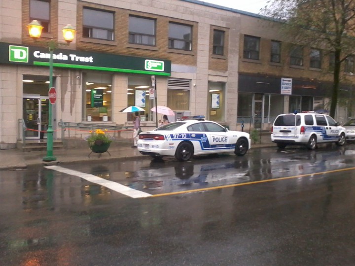 Montreal police stationed outside a TD bank in Outremont.