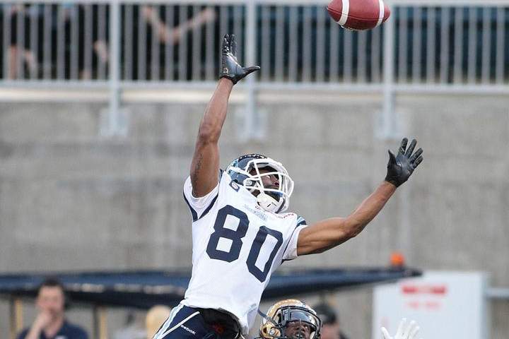 The ball flies out of Romby Bryant's reach during a pre-season game against the Winnipeg Blue Bombers in June. When Bryant was cut by the Argonauts he wondered if his career was over, but he has another shot with the Bombers.
