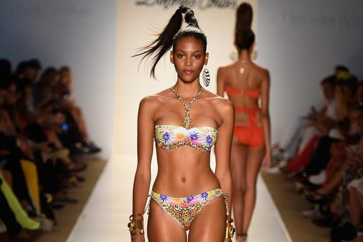 A model walks the runway during Dolores Cortes show at Mercedes-Benz Fashion Week Swim 2015 at Cabana Grande at The Raleigh on July 18, 2014 in Miami, Florida.
