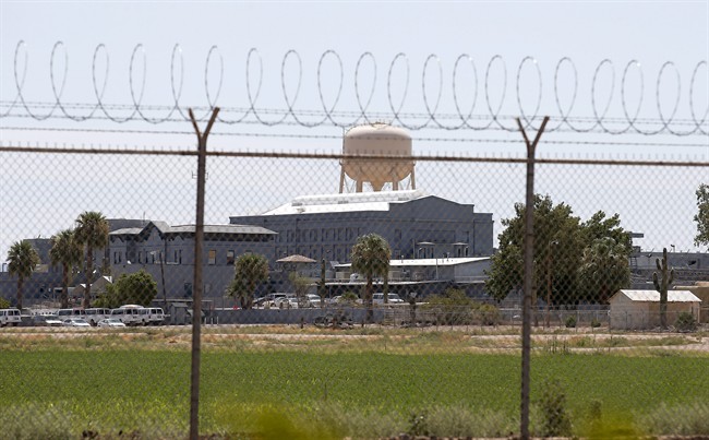 A fence surrounds the state prison in Florence, Ariz. where the execution of Joseph Rudolph Wood took place on Wednesday, July 23, 2014. 