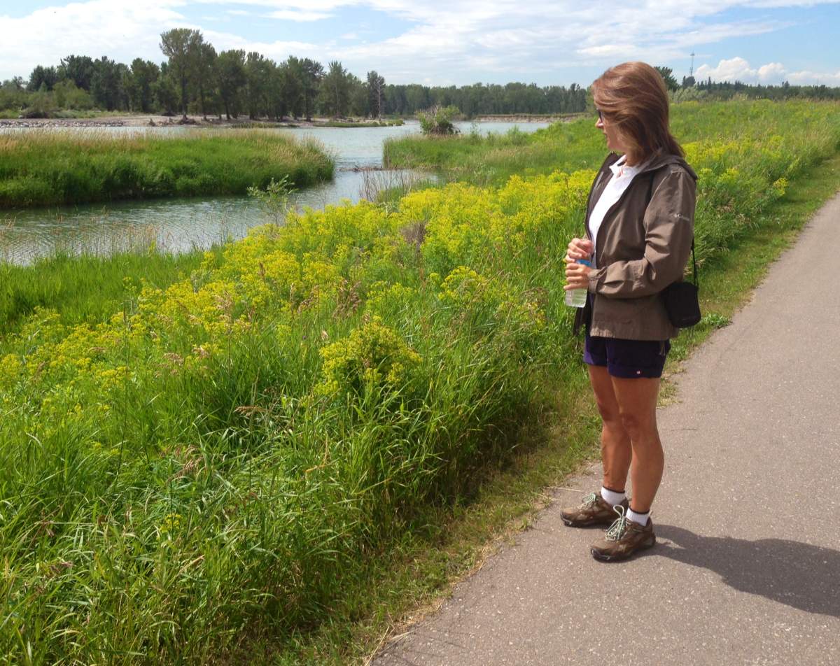 Linda Lelonde stares at the spot where she witnessed a beaver caught in a trap. She says the animal was trying to chew its leg off in order to get free.