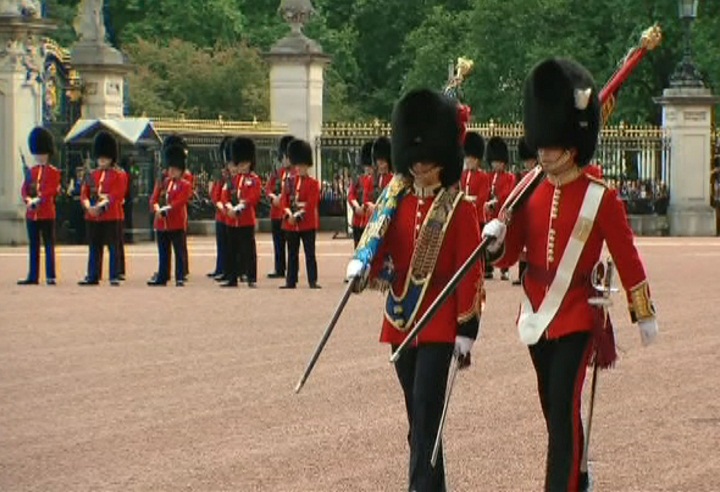 Canadian Van Doos Royal Guards stand guard at Buckingham Palace in London, England on July 14, 2014.