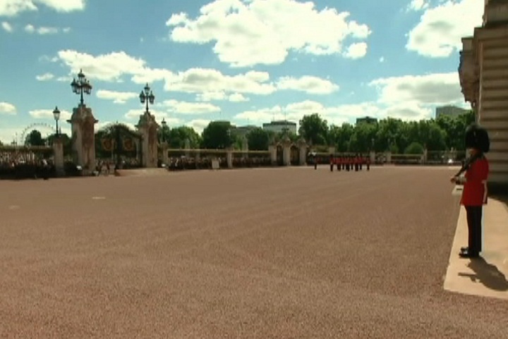Canadian Van Doos Royal Guards stand guard at Buckingham Palace in London, England on July 14, 2014.