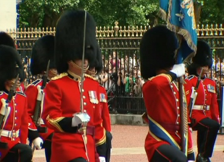 Canadian Van Doos Royal Guards stand guard at Buckingham Palace in London, England on July 14, 2014.