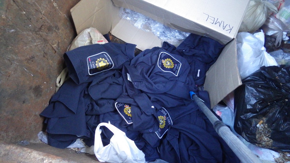 CBSA uniforms found in the dumpster.