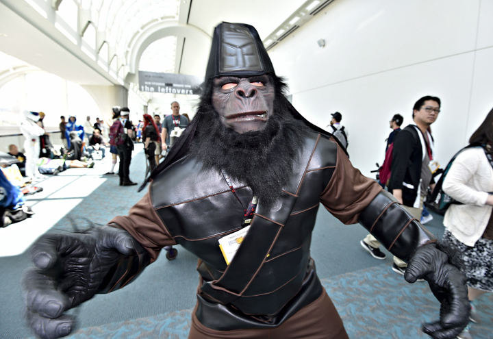 Planet of the Apes character Rocky Johnson walks in the convention center on Day 3 at the 2014 Comic-Con. (Denis Poroy/Invision/AP)
.