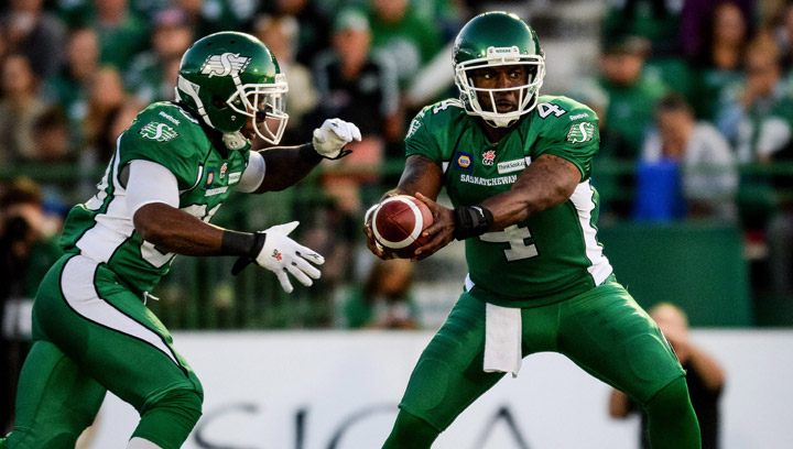 Saskatchewan Roughriders quarterback Darian Durant passes the ball to Saskatchewan Roughriders running back Will Ford during the first quarter of CFL football action against the Toronto Argonauts in Regina, Sask., Saturday, July 26, 2014.