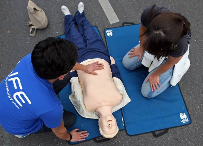 A woman takes a CPR course in Berlin, Germany, Oct. 3, 2011.