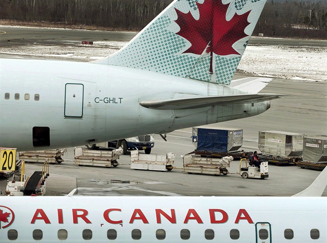 Air Canada isn't reducing or removing a surcharge for higher fuel costs yet, even as those fuel costs come down. 