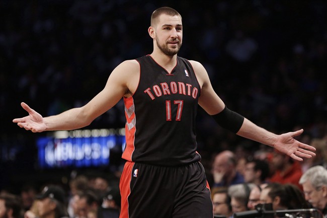 Toronto Raptors' Jonas Valanciunas reacts to a call during the first half of Game 3 of an NBA basketball first-round playoff series against the Brooklyn Nets on Friday, April 25, 2014, in New York.