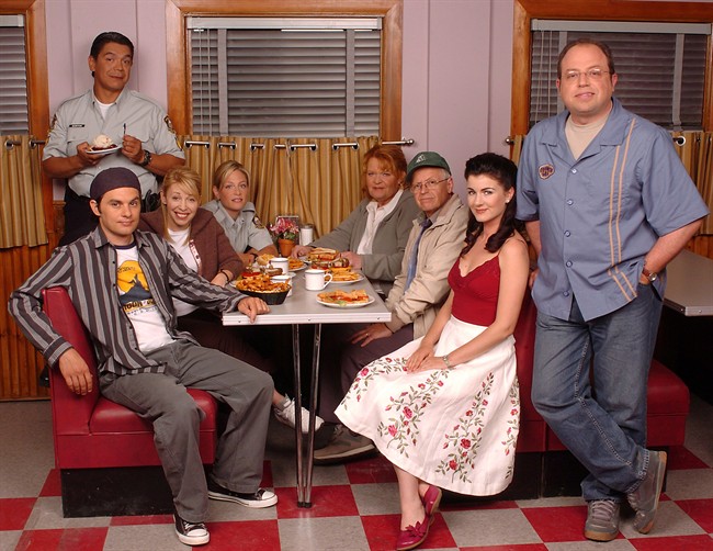 The cast of “Corner Gas: The Movie” poses on the set of the movie in Saskatchewan.
