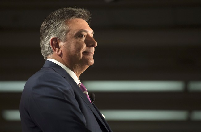 Ontario Finance Minister Charles Sousa speaks to reporters before delivering the 2014 budget at Queen's Park in Toronto on Monday, July 14, 2014.