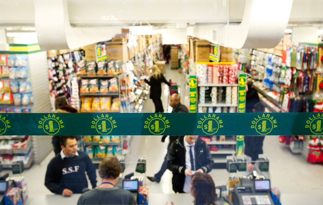 Customers shop at the Dollarama discount store location at Spadina Ave and Adelaide St. West in Toronto, Ont. Dec. 7/2011. Photo by Kevin Van Paassen/The Globe and Mail