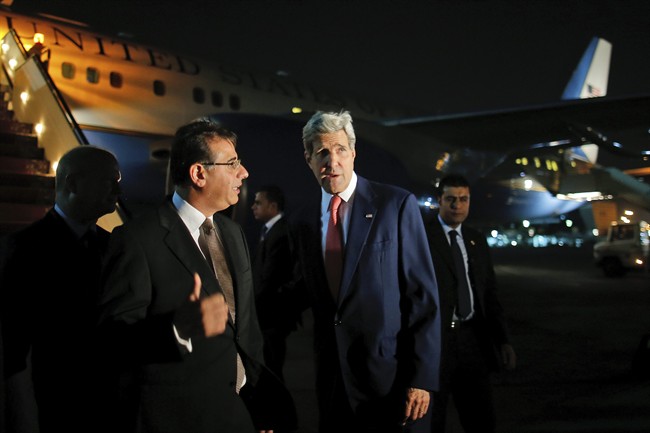 Secretary of State John Kerry is greeted by Egypt's Minister of Foreign Affairs protocol chief Nabil Habashi as Kerry arrives in Cairo, Egypt, Monday, July 21, 2014. Kerry has returned to the Middle East as the Obama administration attempts to bolster regional efforts to reach a cease fire and sharpens its criticism of Hamas in its conflict with Israel. (AP Photo/Charles Dharapak, Pool).