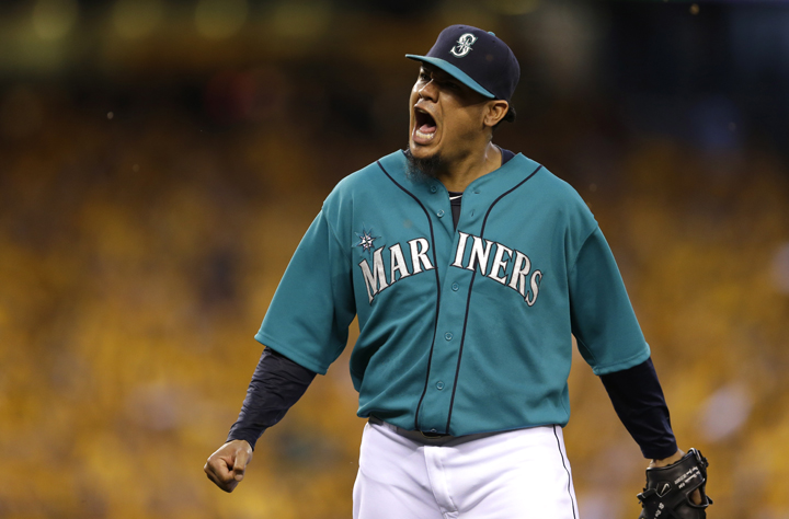 Seattle Mariners starting pitcher Felix Hernandez yells after the third out of the eighth inning of a baseball game against the Oakland Athletics, Friday, July 11, 2014, in Seattle. 