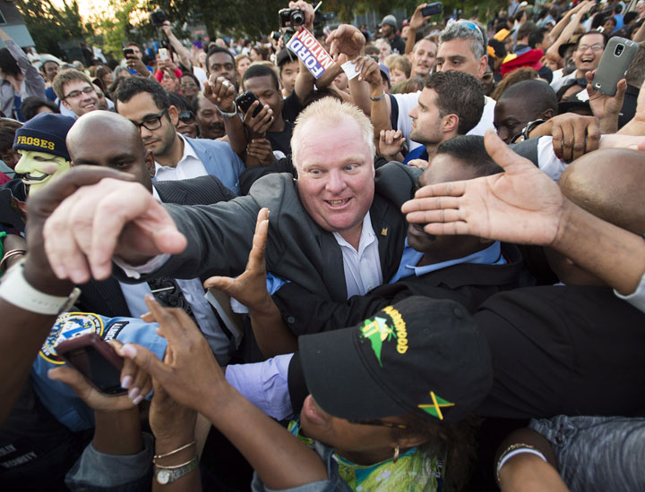 Mayor Rob Ford greets supporters at a party thrown by his family called Ford Fest in Toronto on Friday, July 25, 2014.