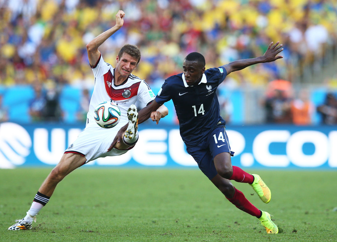 RIO DE JANEIRO, BRAZIL - JULY 04: Blaise Matuidi of France challenges Thomas Mueller of Germany during the 2014 FIFA World Cup Brazil Quarter Final match between France and Germany at Maracana on July 4, 2014 in Rio de Janeiro, Brazil. (Photo by Julian Finney/Getty Images)