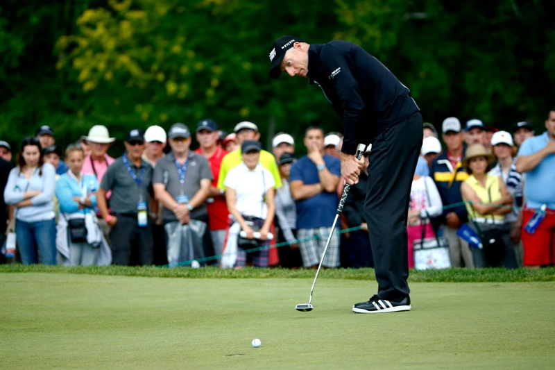 Jim Furyk putts on the fifth hole during the third round of the RBC Canadian Open at the Royal Montreal Golf Club on July 26, 2014 in Montreal, Quebec, Canada. (Photo by Sam Greenwood/Getty Images)
.