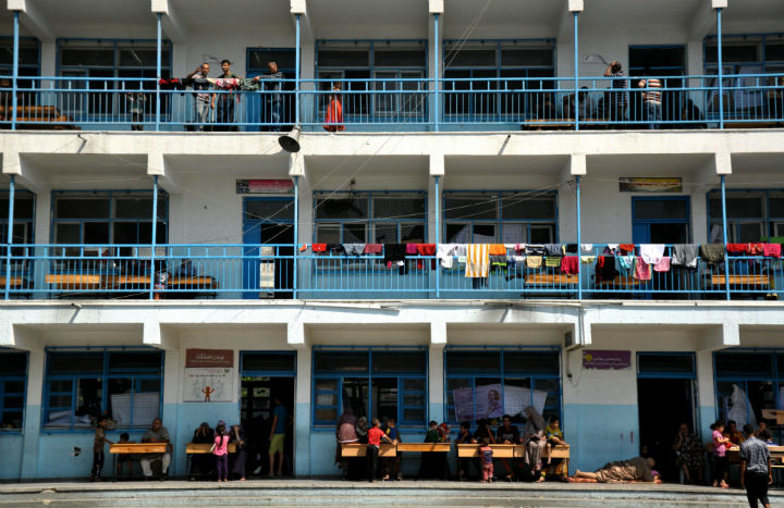 Palestinians take shelter in a UNRWA school after Israeli army launched a ground operation in Gaza City.