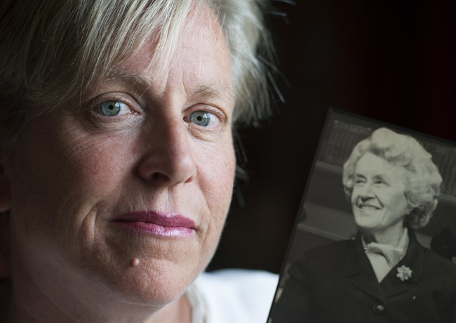 Michele Nadeau, president of the Therese Casgrain Foundation, holds a photo of her grandmother Therese Casgrain in Montreal, Friday, July 25, 2014.THE CANADIAN PRESS/Graham Hughes.