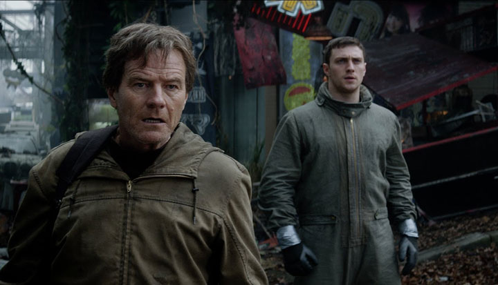 Bryan Cranston and Aaron Taylor-Johnson in a scene from 'Godzilla.'.