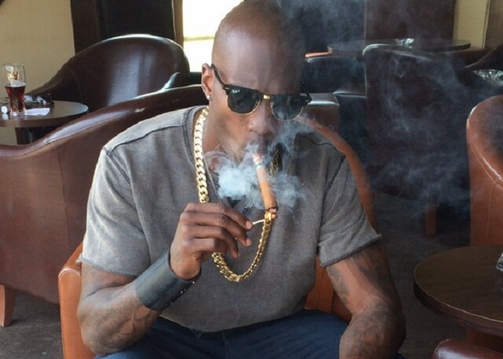 Montreal Alouettes player Chad Johnson is pictured smoking a stogie in his Twitter avatar.