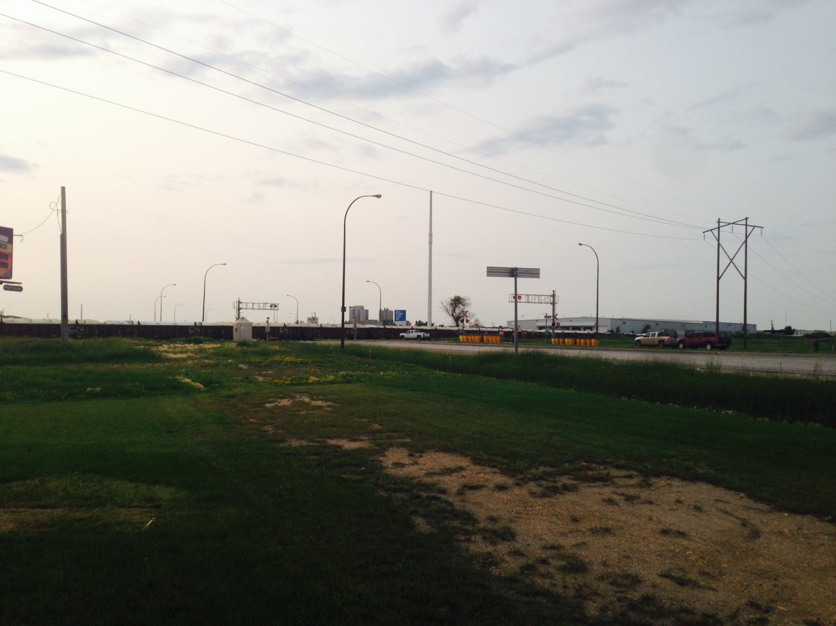 Train derails east of Kenaston Blvd Wednesday, forces traffic to be rerouted. July 16, 2014.