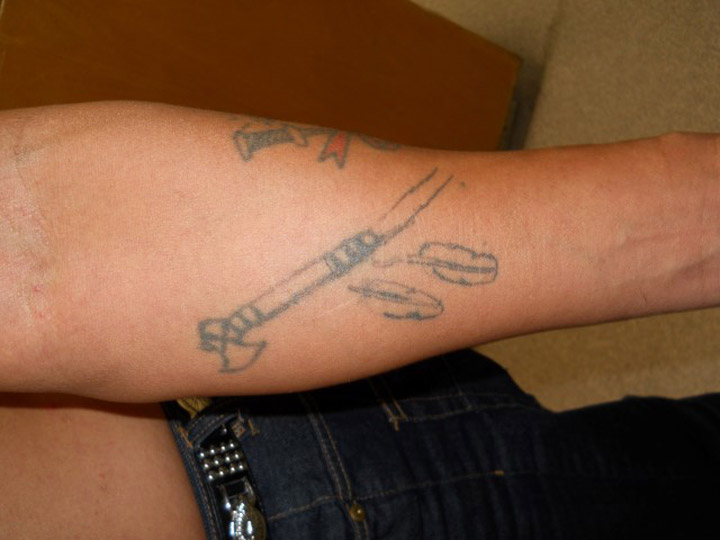 Saskatchewan RCMP have released this photo of a tattoo on Vincent Alex Desjarlais’s left forearm.