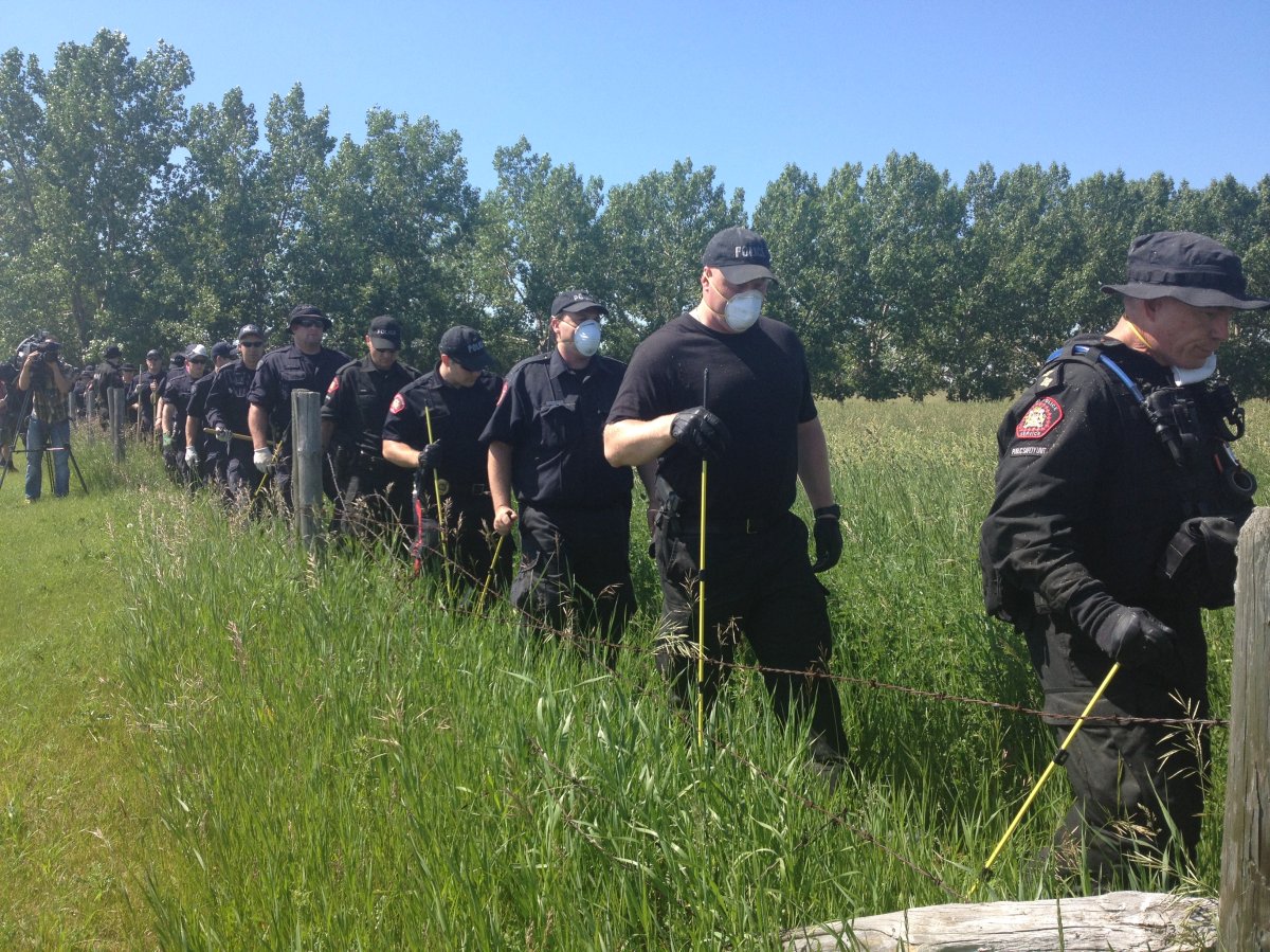 Police search a property north of Calgary.