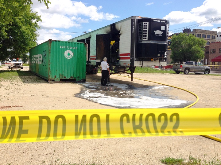 Fire crews dousing a blaze in a trailer in Winnipeg's core area discovered a badly injured man inside on Tuesday, July 8, 2014.