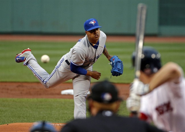 Toronto Blue Jays starting pitcher Marcus Stroman delivers to the Boston Red Sox during the first inning of a baseball game at Fenway Park in Boston, Tuesday, July 29, 2014. (AP Photo/Elise Amendola).