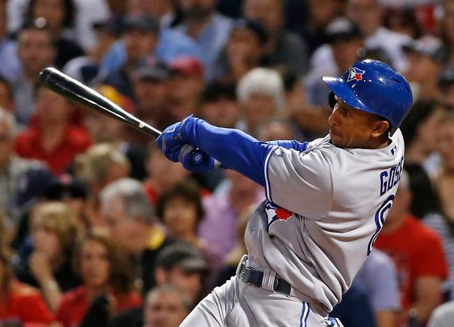 Toronto Blue Jays' Anthony Gose hits a 2-RBI double during the fourth inning of a baseball game against the Boston Red Sox at Fenway Park in Boston, Tuesday, July 29, 2014.