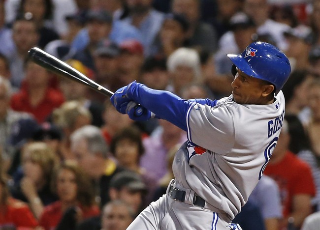 Toronto Blue Jays' Anthony Gose hits a 2-RBI double during the fourth inning of a baseball game against the Boston Red Sox at Fenway Park in Boston, Tuesday, July 29, 2014.