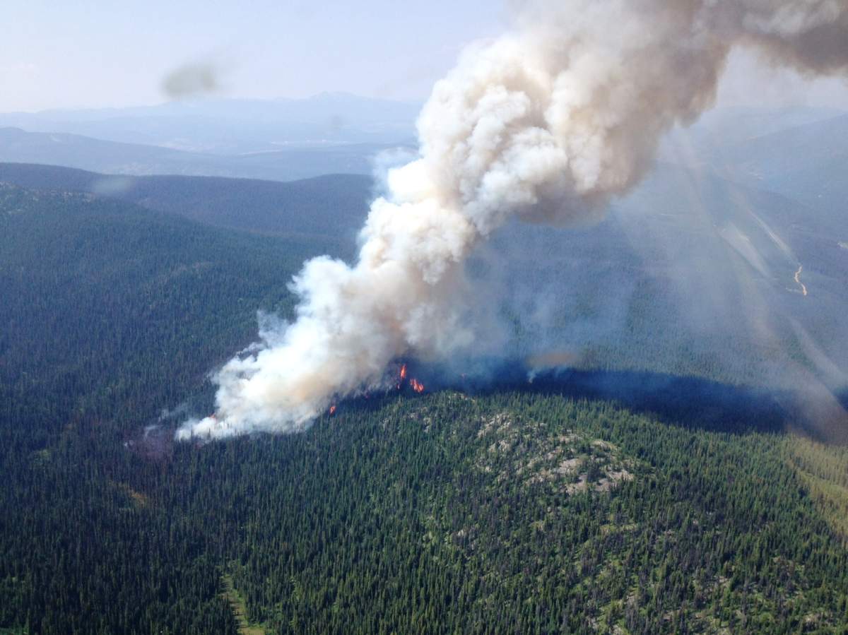 Crews have pulled out because of aggressive fire behaviour. 