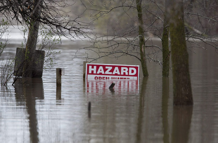 Waters from the swollen Assiniboine River flood the KOA campground in St. Francois Xavier, Manitoba on Friday, May 13, 2011.