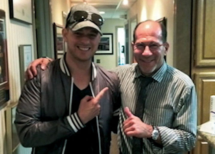 Michael Buble, pictured with dentist David Bloom.