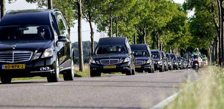 The convoy of hearses carrying coffins containing the remains of victims of the downed Malaysia Airlines flight MH17 drive near Hilversum after leaving the Eindhoven Airbase to Hilversum on July 23, 2014.