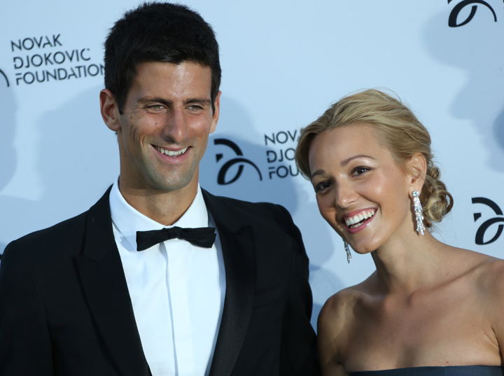 FILE - In this Monday, July 8, 2013 file photo, Novak Djokovic, and Jelena Ristic arrive at a Gala dinner at the Roundhouse in Camden, north London, for the inaugural London fundraiser in aid of the Novak Djokovic Foundation. The Wimbledon champion married his longtime girlfriend Jelena Ristic on Thursday, July 10 in an upscale resort on the Adriatic coast in Montenegro. 