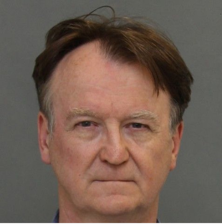 Ian Campbell, 61, charged with four counts of Voyeurism.