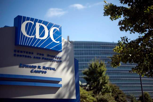 In this Oct. 8, 2013 file photo, a sign marks the entrance to the federal Centers for Disease Control and Prevention,in Atlanta. The U.S. Department of Defence says it has determined that possibly live anthrax was mistakenly sent to labs in Canada and Washington state, in addition to the numerous labs in the United States and abroad that were announced last week. 