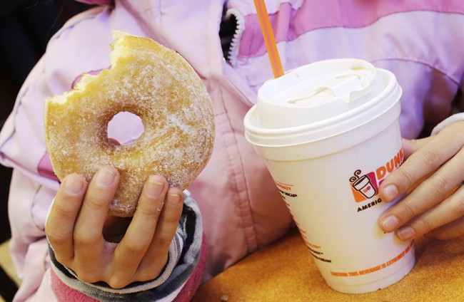 Dunkin' Donuts, the largest bakery chain in the United States, anticipates a sales slowdown. Tim Hortons meanwhile hopes to ramp up U.S. sales.