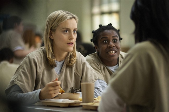 Taylor Schilling, left, and Uzo Aduba in a scene from "Orange Is the New Black."